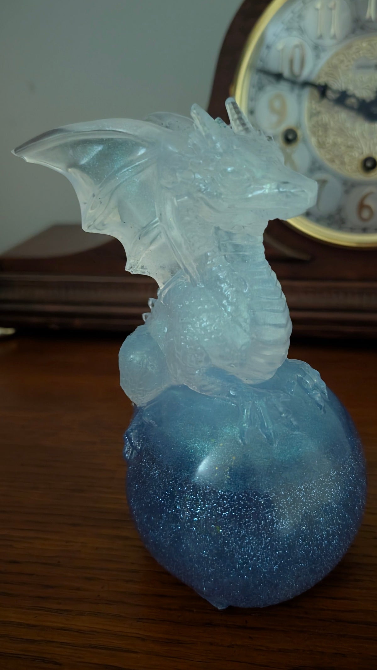 Handmade Resin Dragon Figurine on Icy Blue Sphere