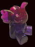 A small translucent elephant figurine in a two-tone purple and magenta color
