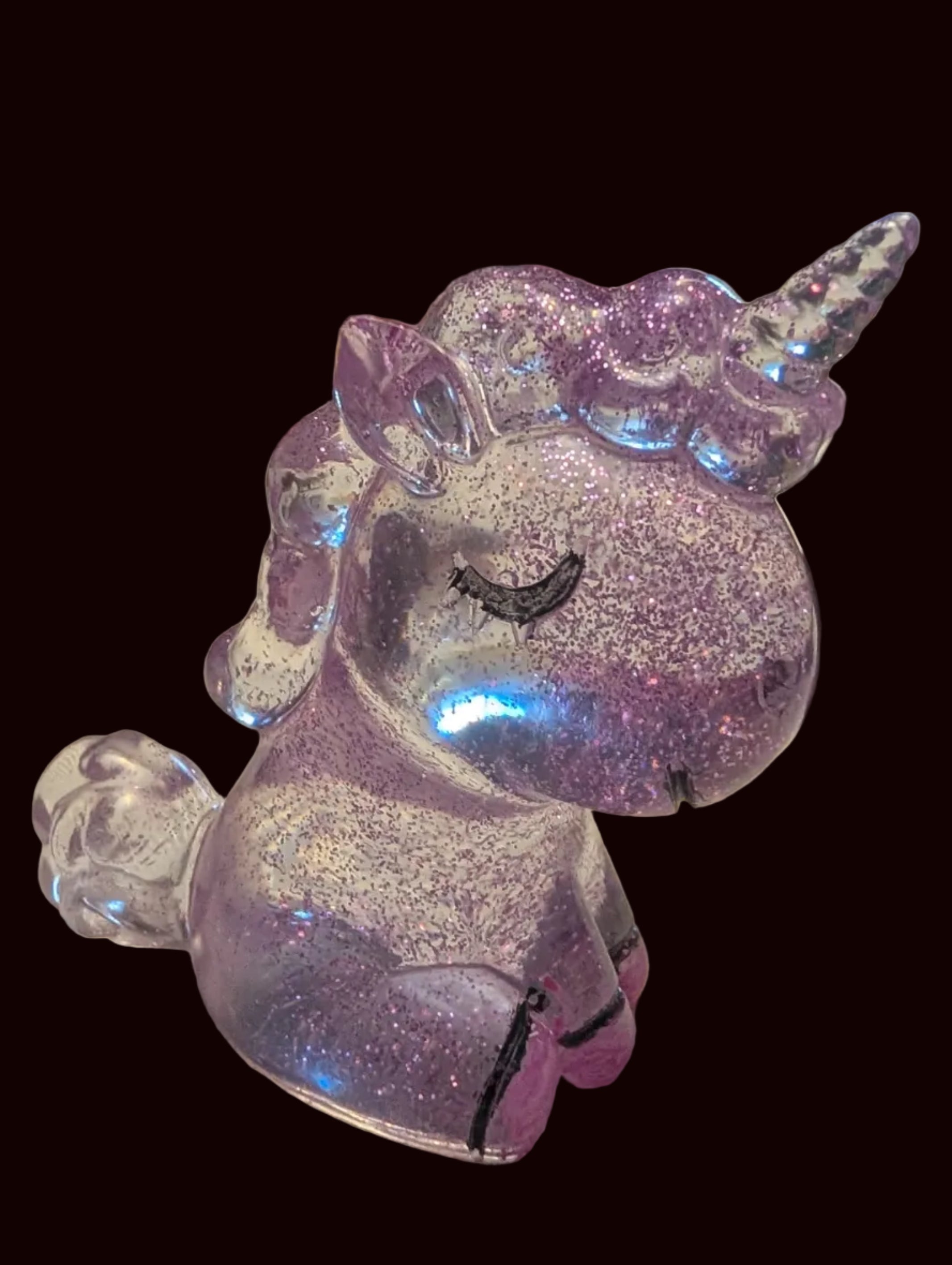 Iridescent purple Unicorn to add to any collection.
